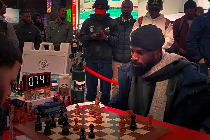 A photo of Tunde Onakoyaa native Nigerian who is trying to play chess for 58 and a half hours, which would be a new record.